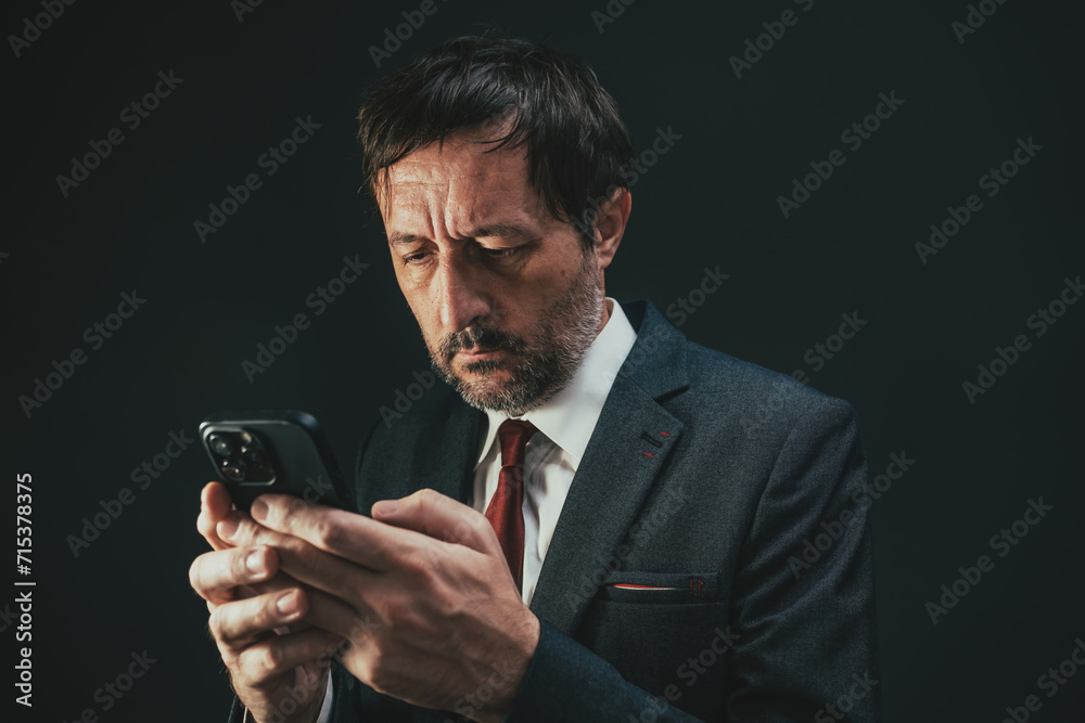 Businessman using cellphone, adult entrepreneur with mobile smart phone Businessman using cellphone, adult entrepreneur with mobile smart phone