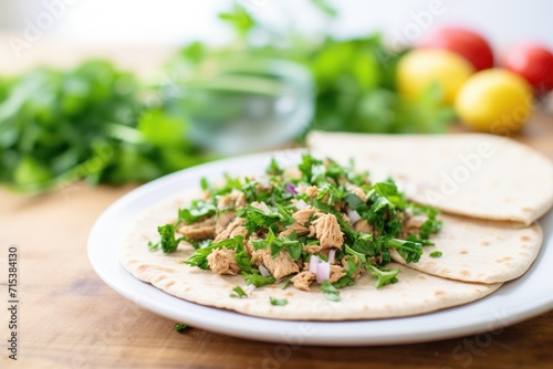 whole wheat pita with a side of green parsley
