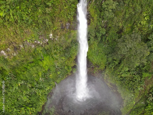 A Hidden Gem Revealed. Soaring Over a Natural Wonder of a Beautiful Waterfall