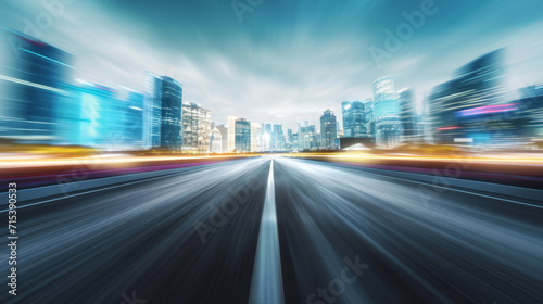 Moving forward at high speed blurred and empty road with cityscape background. 