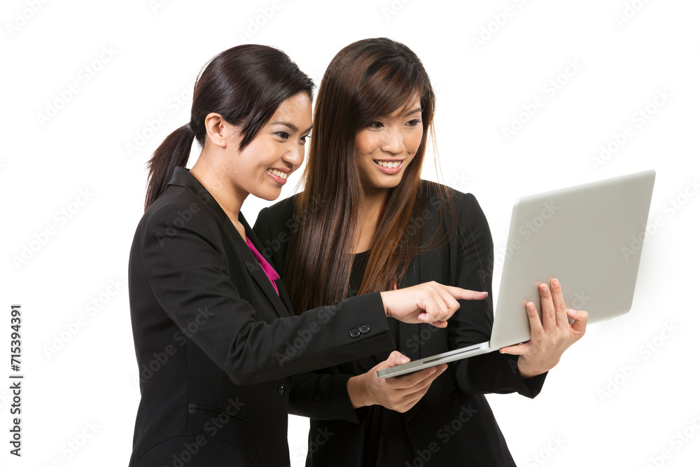 Chinese businesswomen having a meeting with laptop. Chinese businesswomen having a meeting with laptop.