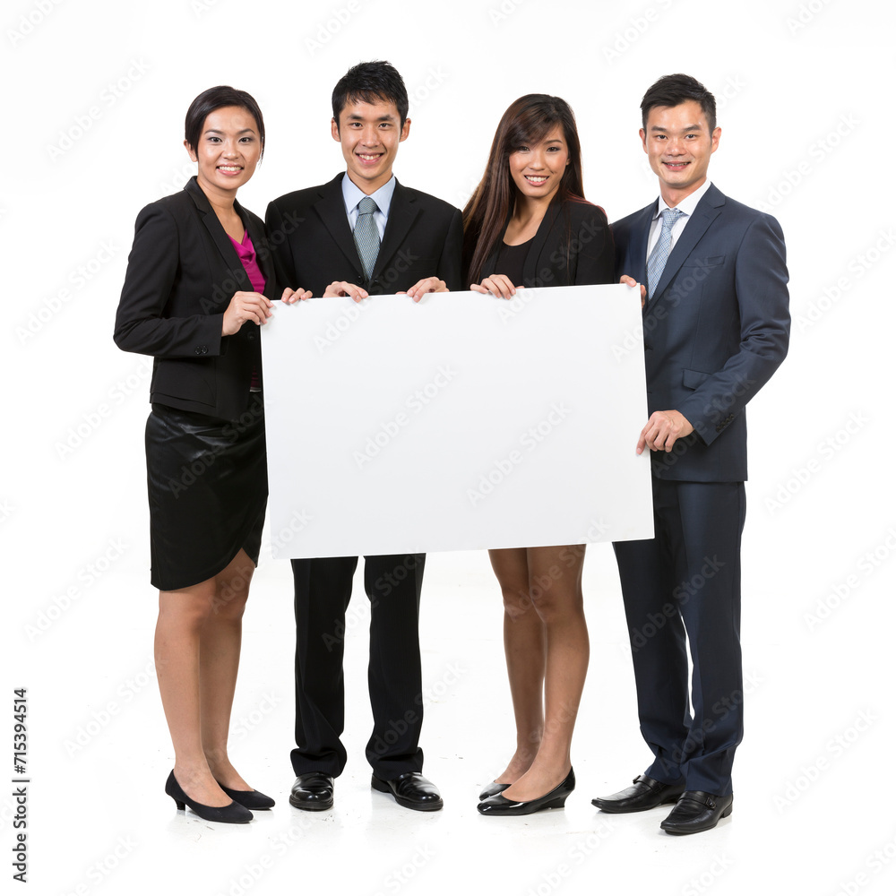 Group of Chinese businesspeople with a banner ad. Group of Chinese businesspeople with a banner ad.