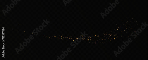 Golden sequins glow with many lights. Glittering dust. Luxurious background of golden particles.