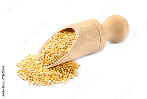 Wooden scoop with raw quinoa isolated on white