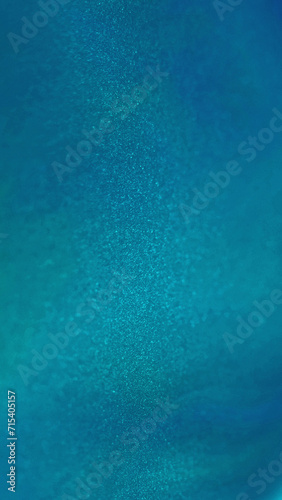 Paint glitter fluid. Blur vibrant blue purple color sparkling oil ink emulsion flow opener motion abstract art background.