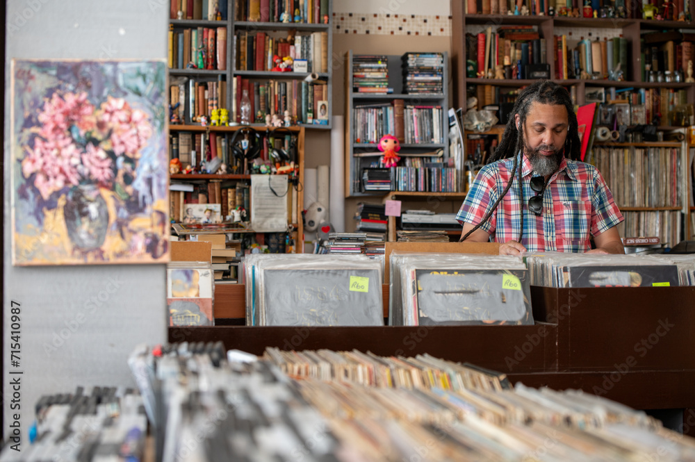 Man seen searching through vinyl records
