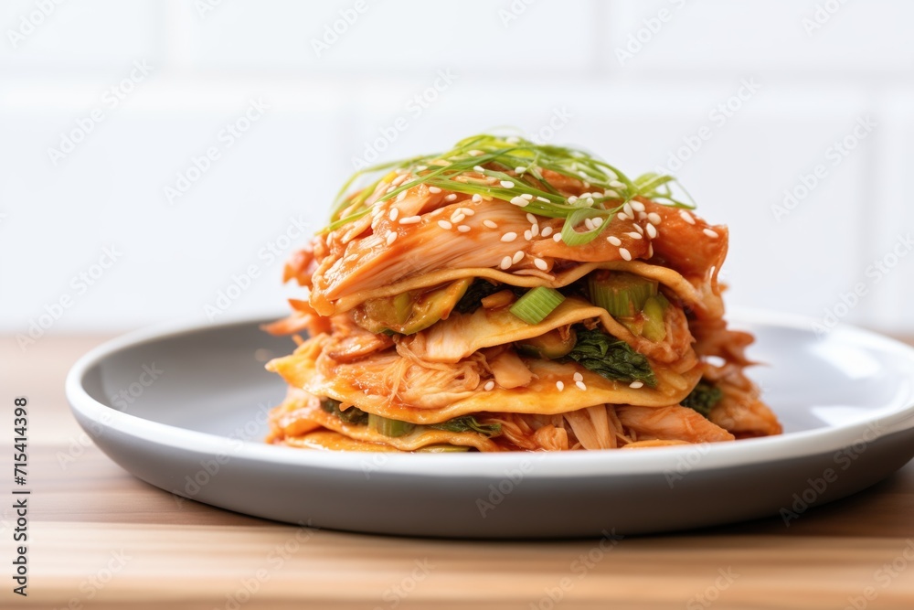 side view of multiple stacked kimchi pancakes
