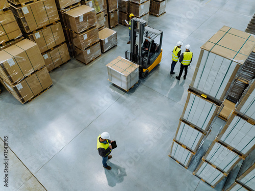 Photography Top view of workers modern warehouse storage of retail shop, large factory workshop space