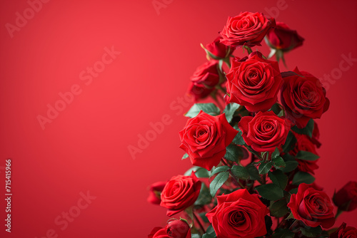 Bouquet of vibrant red roses against a red background  symbolizing romance  ideal for Valentine s Day or anniversaries
