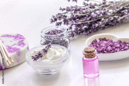 lavender flowers in organic cosmetic set on white background