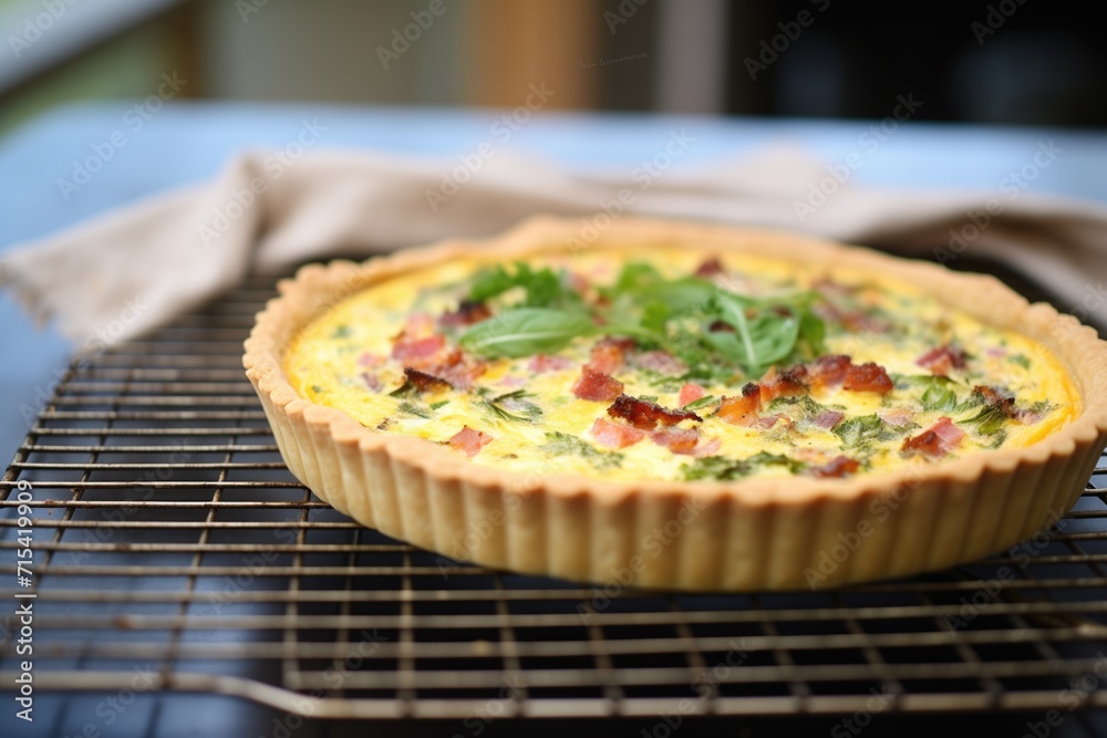 quiche with flaky crust on a cooling rack quiche with flaky crust on a cooling rack