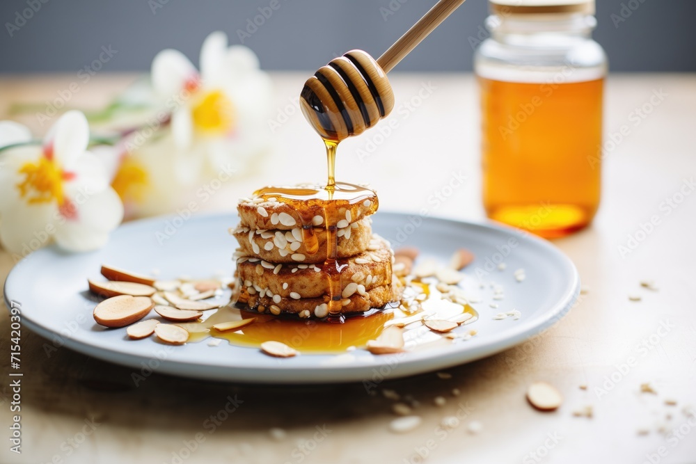 almond butter on rice cake with almonds and honey drizzle