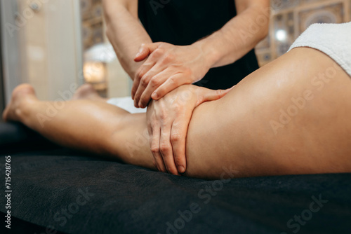 Male hands doing anti-cellulite massage