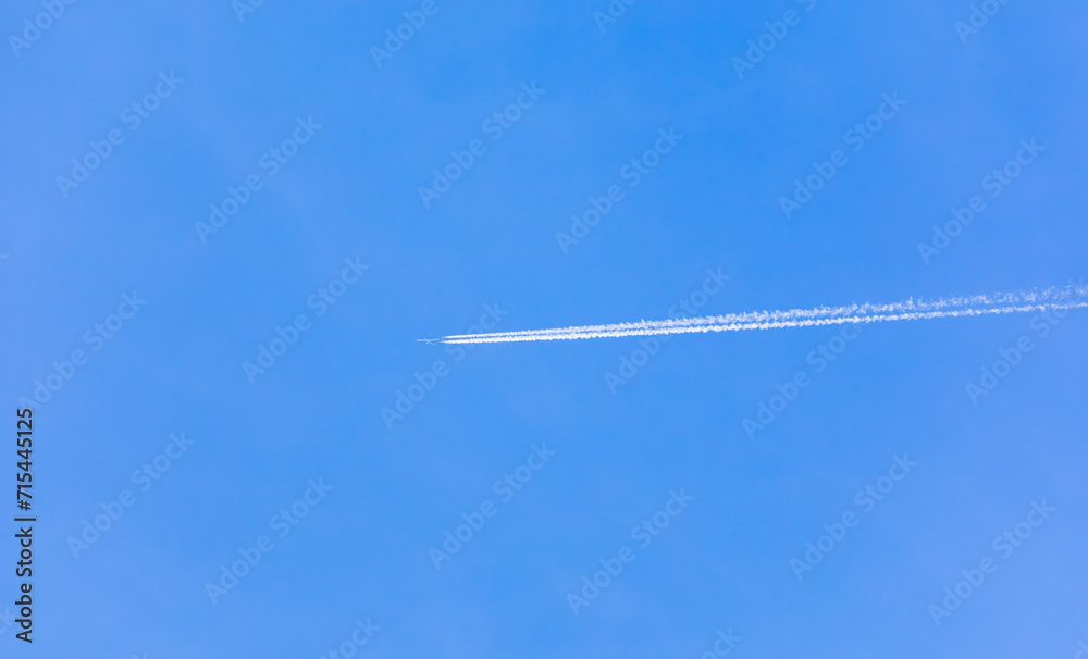 The place where the plane passed in the blue sky - contrails The place where the plane passed in the blue sky - contrails