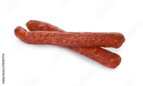 Thin dry smoked sausages isolated on white