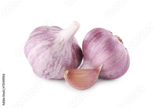 Fresh raw garlic heads and clove isolated on white