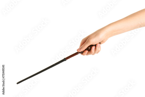 Woman holding wooden magic wand on white background, closeup