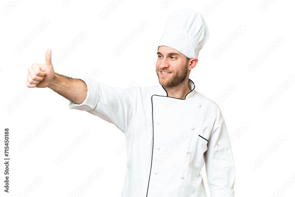 Young blonde man Chef over isolated chroma key background giving a thumbs up gesture Young blonde man Chef over isolated chroma key background giving a thumbs up gesture