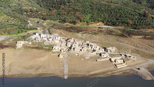 Sfentyli is an abandoned village which is sinking every winter when the dam of Aposelemi gets filled with water, Crete, Greece. photo