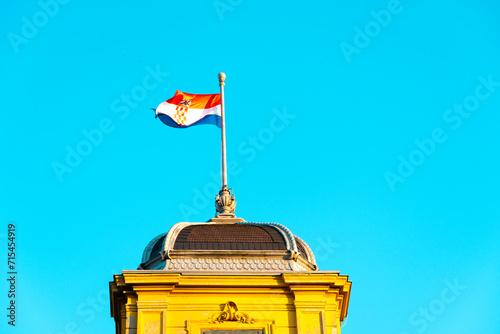 Croatia, Zagreb, Croatian flag on top of Croatian National Theatre photo