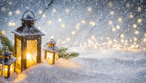 christmas background with lanterns in snow and glowing lights