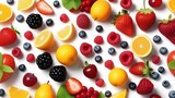 Strawberry, raspberry, blueberries, lemon and grapefruit on white table