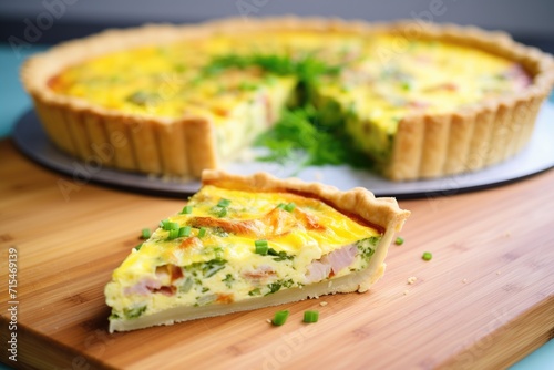 sliced quiche with melted cheese oozing out