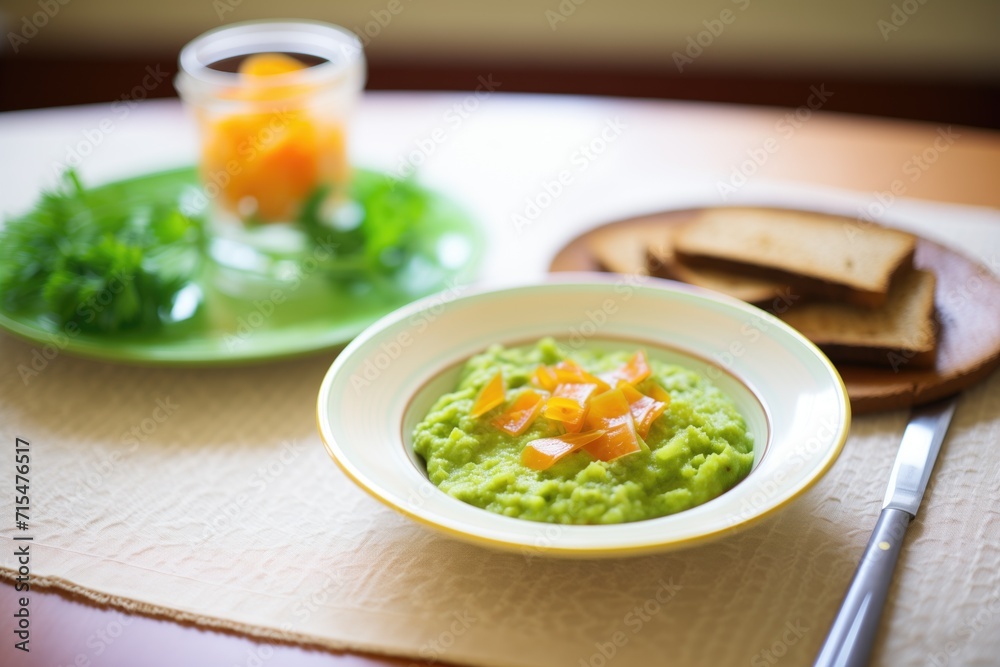 split pea soup served with side of rye bread on plate split pea soup served with side of rye bread on plate