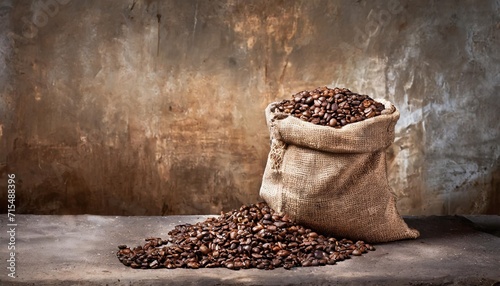 fresh old sack of coffee grains and brown old wall background