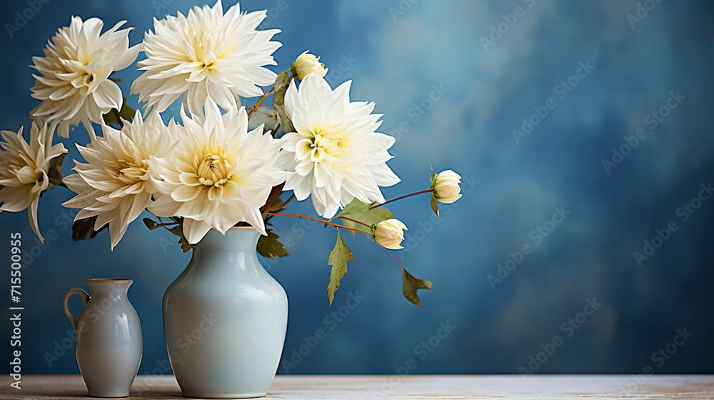Soft home decor, white jug, vase with white small flowers on a white vintage wall background and on a wooden shelf. Interior. Soft home decor, white jug, vase with white small flowers on a white vintage wall background and on a wooden shelf. Interior.