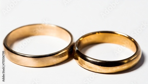 gold wedding rings isolated on white background
