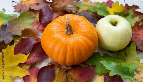 autumn pumkins harvested apples and colorful leaves composition fall thanksgiving festive background