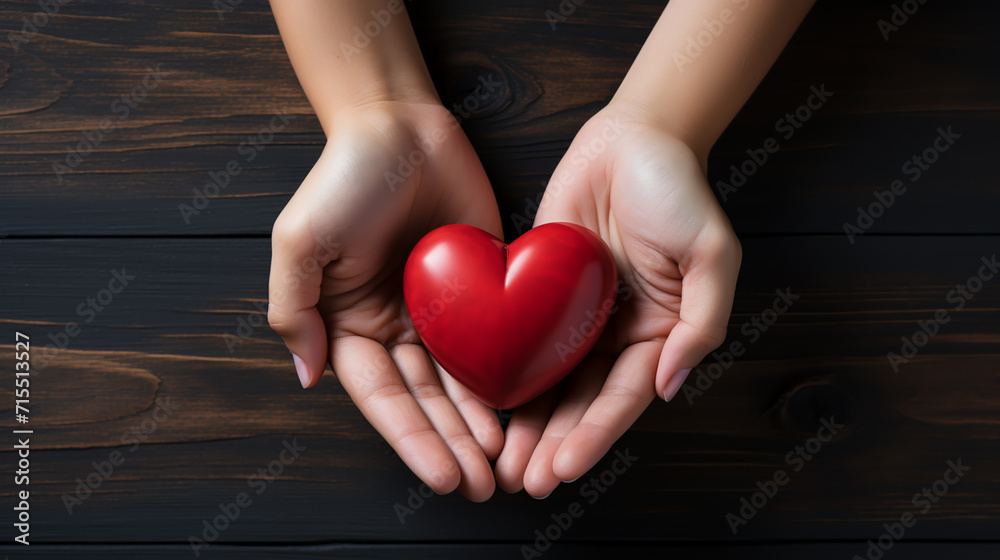 Soft Red Toy Heart in the Woman Hands on Light Background. Valentine Day Concept. Flat Lay Top View. Copy Space For Your Text. Soft Red Toy Heart in the Woman Hands on Light Background. Valentine Day Concept. Flat Lay Top View. Copy Space For Your Text.