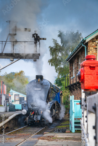 The Sir Nigel Gresley steam locomotive about to depart from Grosmont Station on the North Yorkshire Moors Railway Line, Yorkshire, England photo
