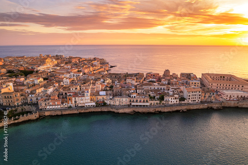 Aerial morning view of the old and fortified town Syracuse, UNESCO World Heritage Site, Ortigia island, Syracuse province, Ioanian sea, Sicily, Mediterranean photo