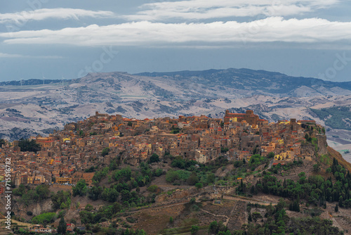 The small wonderful town of Calascibetta on top of a rocky hill in the Sicilian countryside, Enna province, Sicily, Mediterranean photo