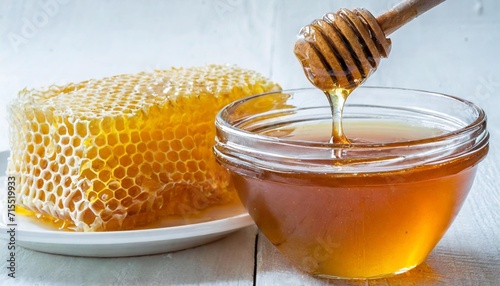 honey isolated on white or transparent background jar with honey honeycomb and honey dipper with drop of honey