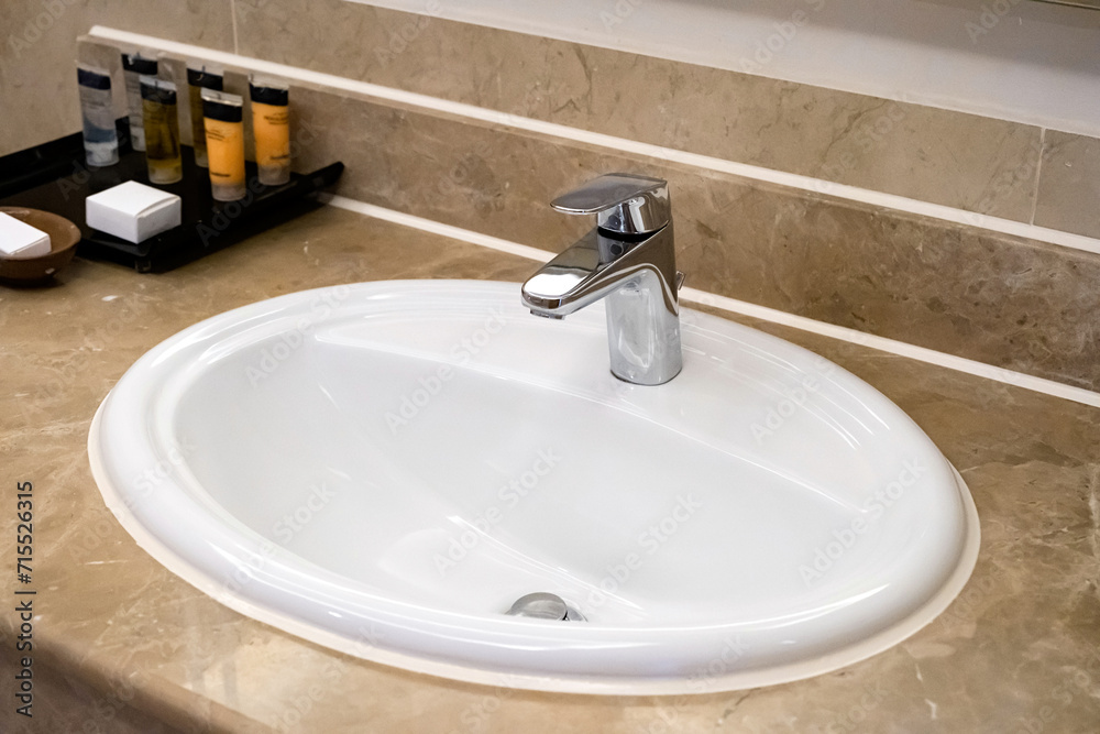 faucet for water and white sink on marble counter faucet for water and white sink on marble counter