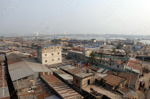Chittagong's Karnaphuli has become smaller due to encroachment and pollution. People are occupying the place of the river and building houses there. © Vector photo gallery