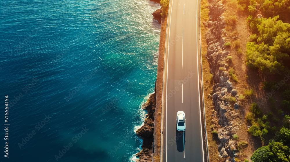 Aerial view of car driving on asphalt highway road near the ocean. Sun shine. Travel concept. Generative AI - obrazy, fototapety, plakaty 
