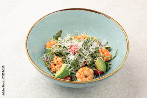 Portion of gourmet caesar salad with shrimp photo