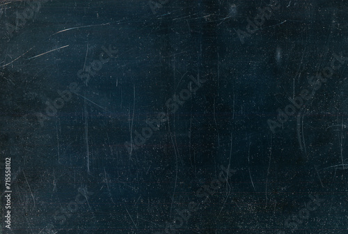 Dust scratches texture. Distressed overlay. Old film noise. White stain particles defect weathered surface on dark black grunge illustration abstract background. photo