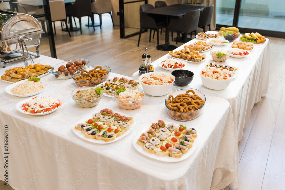 assortment of delicious appetizers, expertly arranged on a captivating catering table