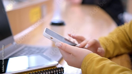 Young woman using smartphone at mall. Caucasian girl looking at mobile phone. Communication, work or study, connection, mobile apps, technology, lifestyle concept 4K photo