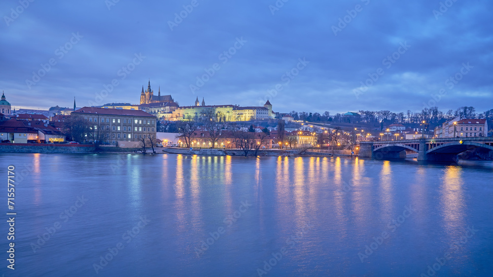 Cityscape evening view of Prague castle and Vltava river in Czech republic