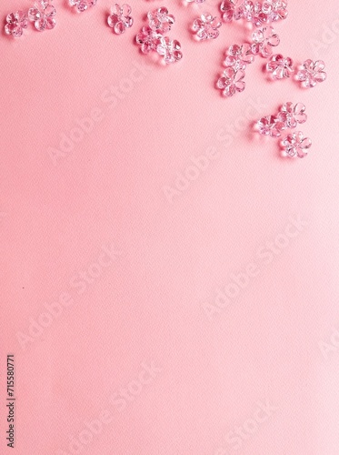 Composition with delicate flowers on pink background, card, space for text, women's holiday  © Iryna