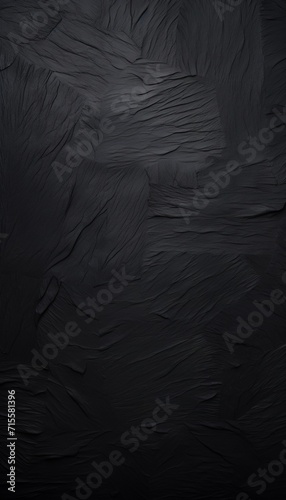 Sheet of black paper textured background. Dark stone background with copy space for text.