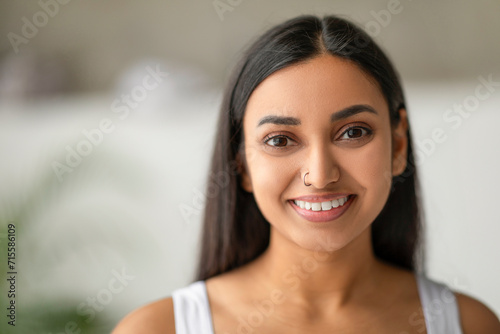 Portrait Of Happy Attractive Young Indian Lady Looking At Camera