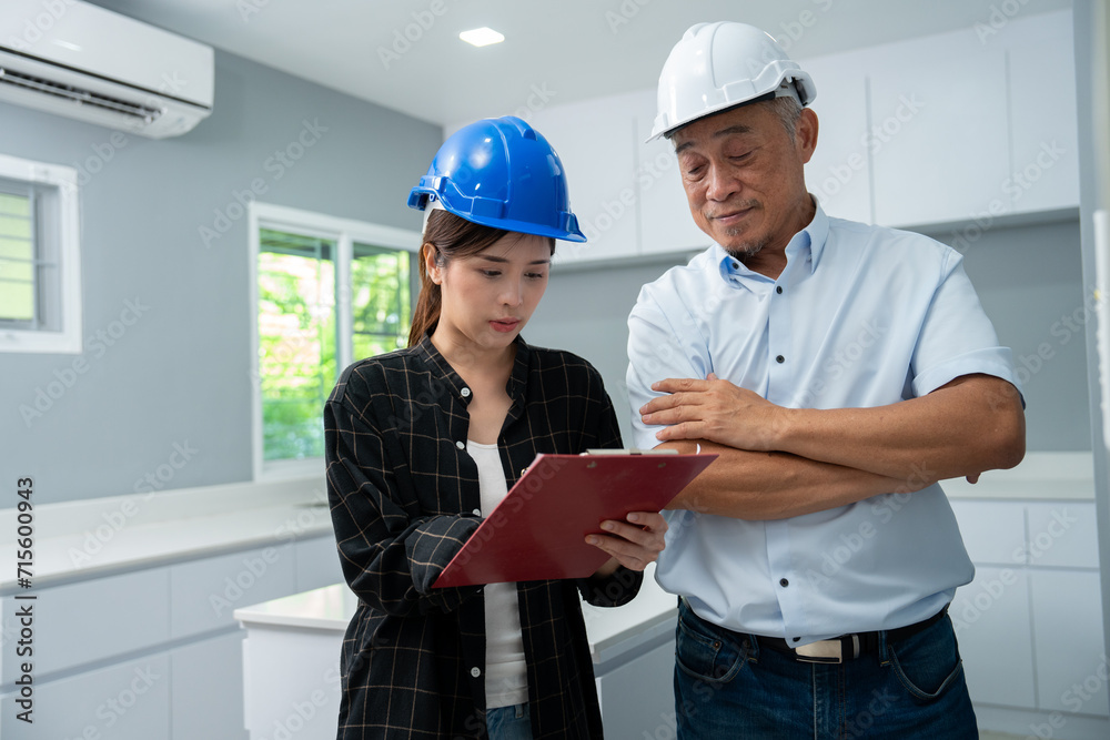 Senior home inspector checking home defects and teaching young engineers, before handing it over to client. Young engineers learn home inspection with Senior, Real estate, and renovation concepts. Senior home inspector checking home defects and teaching young engineers, before handing it over to client. Young engineers learn home inspection with Senior, Real estate, and renovation concepts.