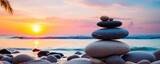 tower of zen stones on paradise beach balance concept